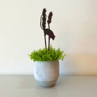 A Black Bird Sang Pot Stem-Harvest Mouse on Wheat